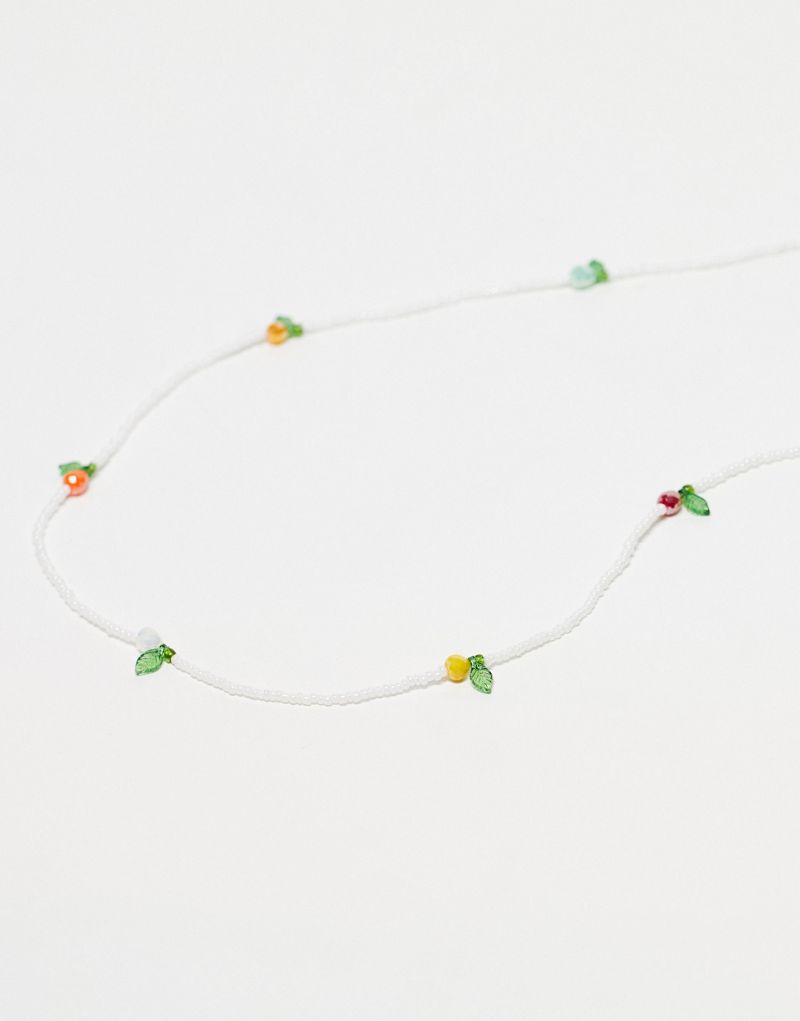 ASOS DESIGN sunglasses chain with faux pearl and beaded fruit design ASOS DESIGN