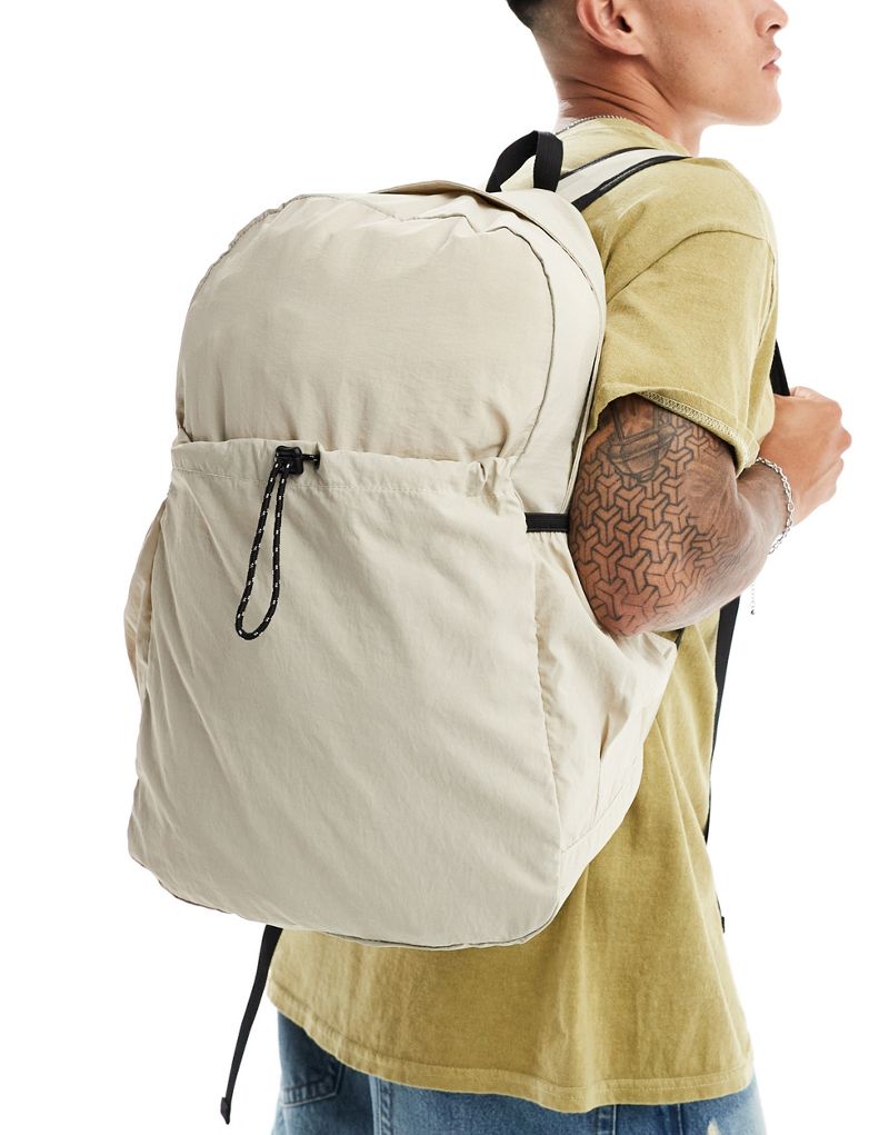 ASOS DESIGN soft backpack in ecru with black detailing ASOS DESIGN