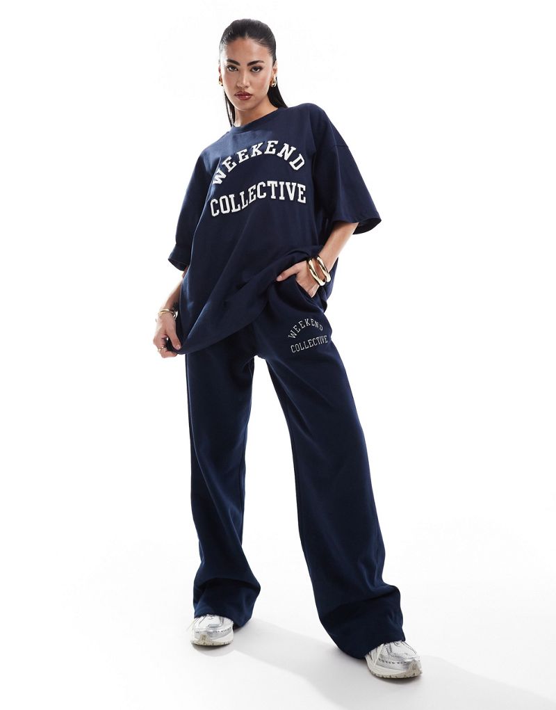 ASOS DESIGN Weekend Collective oversized t-shirt with varsity logo in navy ASOS Weekend Collective