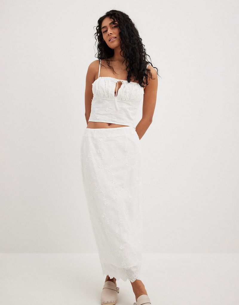 NA-KD anglaise midi skirt in white NAKD