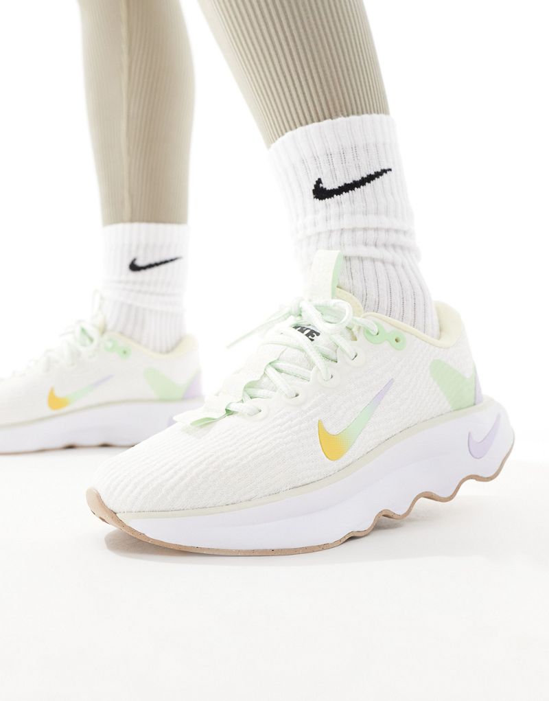 Nike Training Motiva sneakers in off white Nike