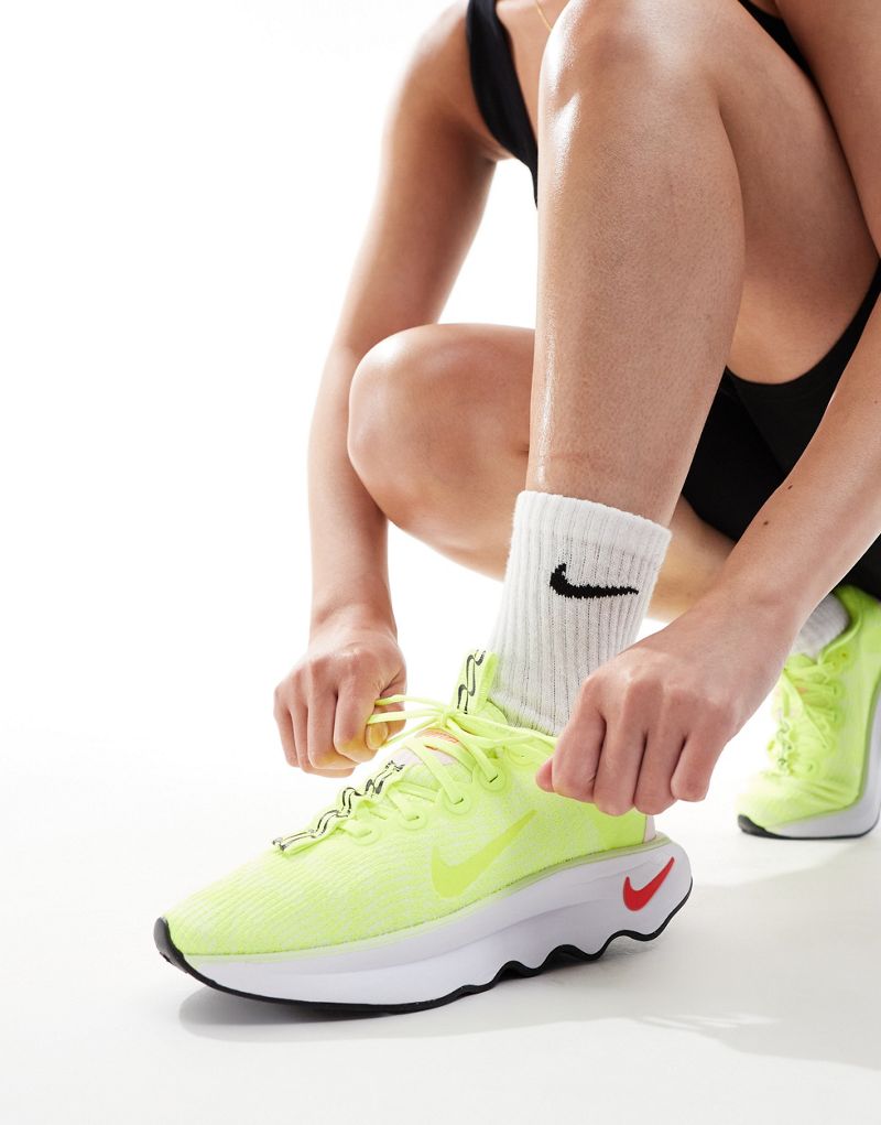 Nike Training Motiva sneakers in neon green Nike