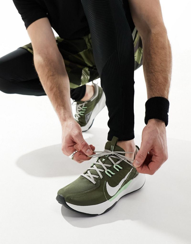 Nike Running Juniper Trial 2 sneakers in dark green and white Nike