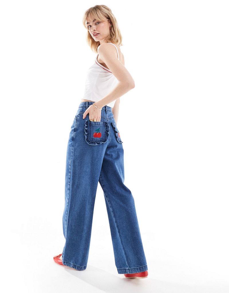 Neon Rose wide leg jeans with cherry applique pockets in mid blue Neon Rose