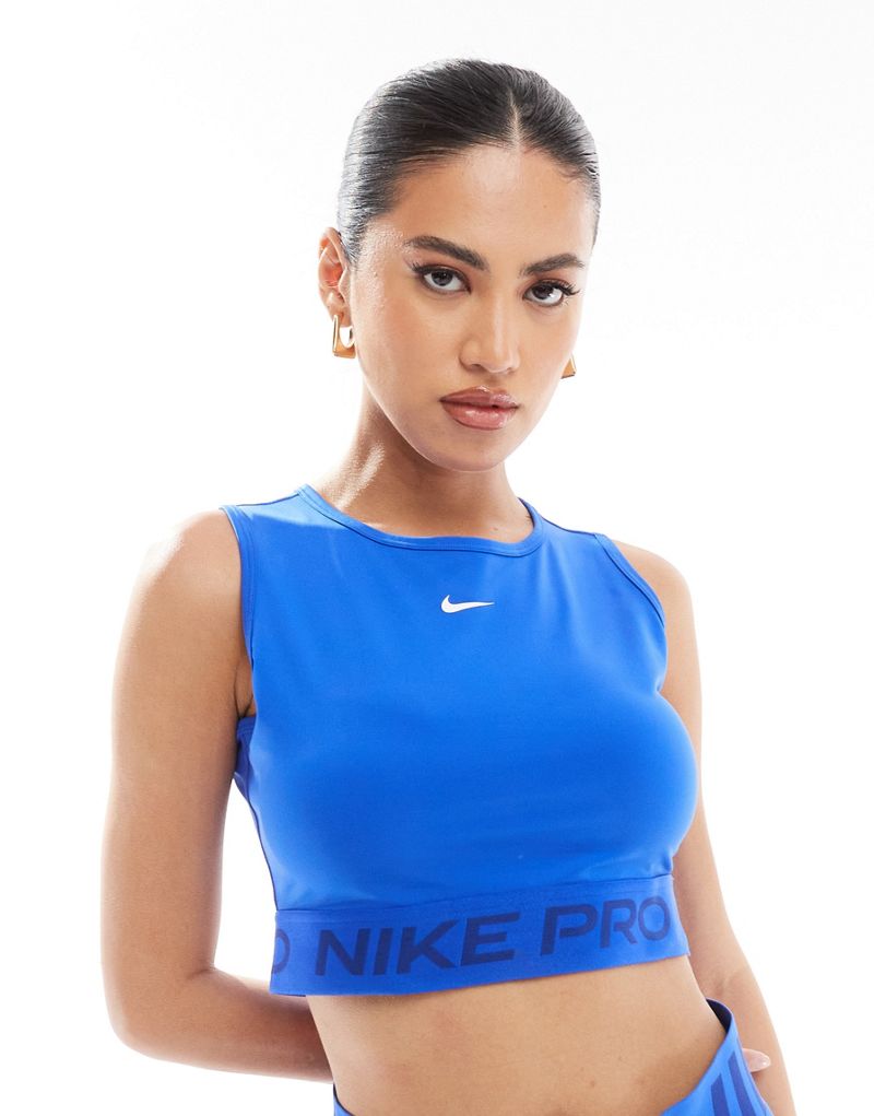 Nike Training Pro 365 cropped tank top in blue Nike