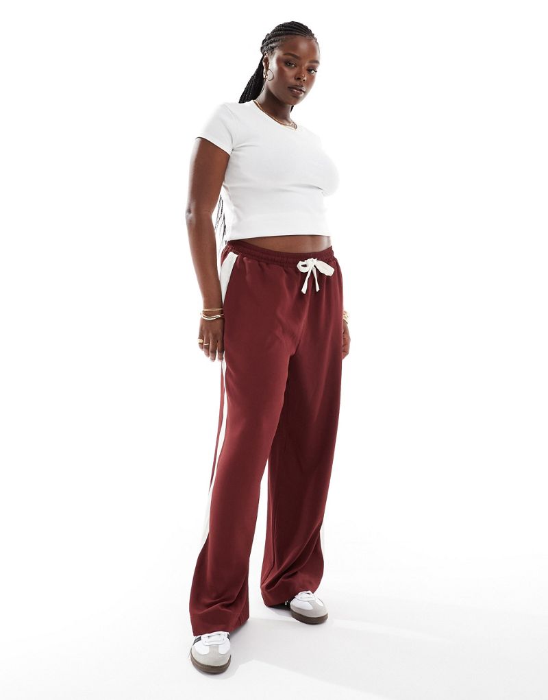 ASOS DESIGN Curve pull-on pants with contrast panel in burgundy ASOS Curve