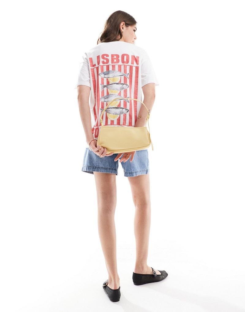 ASOS DESIGN oversized T-shirt with Lisbon holiday graphic in ivory ASOS DESIGN