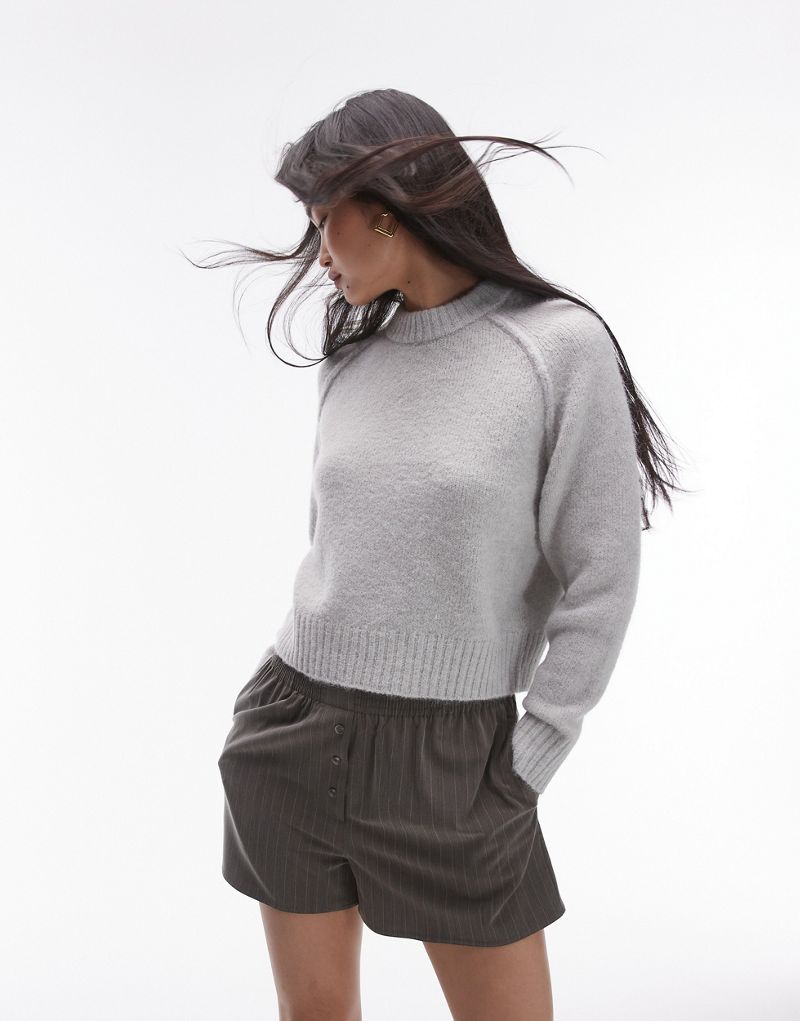 Topshop knit crew with raglan and exposed seam sweater in light gray TOPSHOP