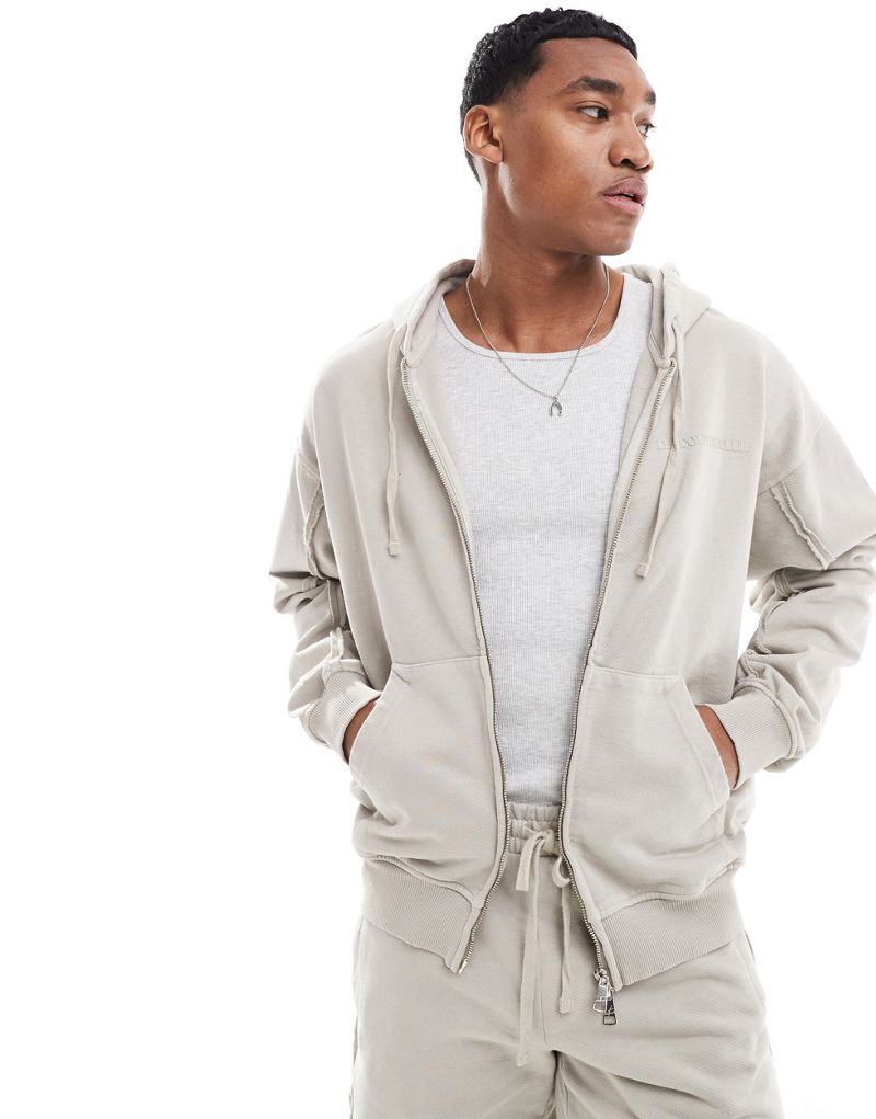 The Couture Club raw seam zip up hoodie in beige - part of a set The Couture Club