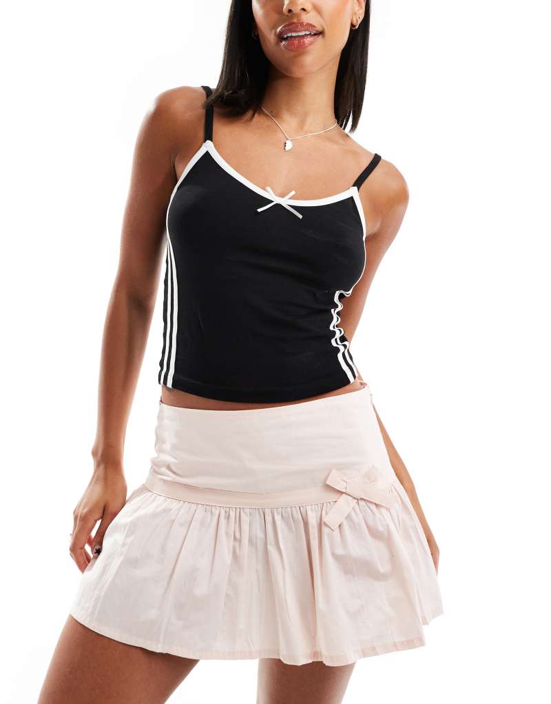 Motel fita bow detail mini skirt in light pink Motel