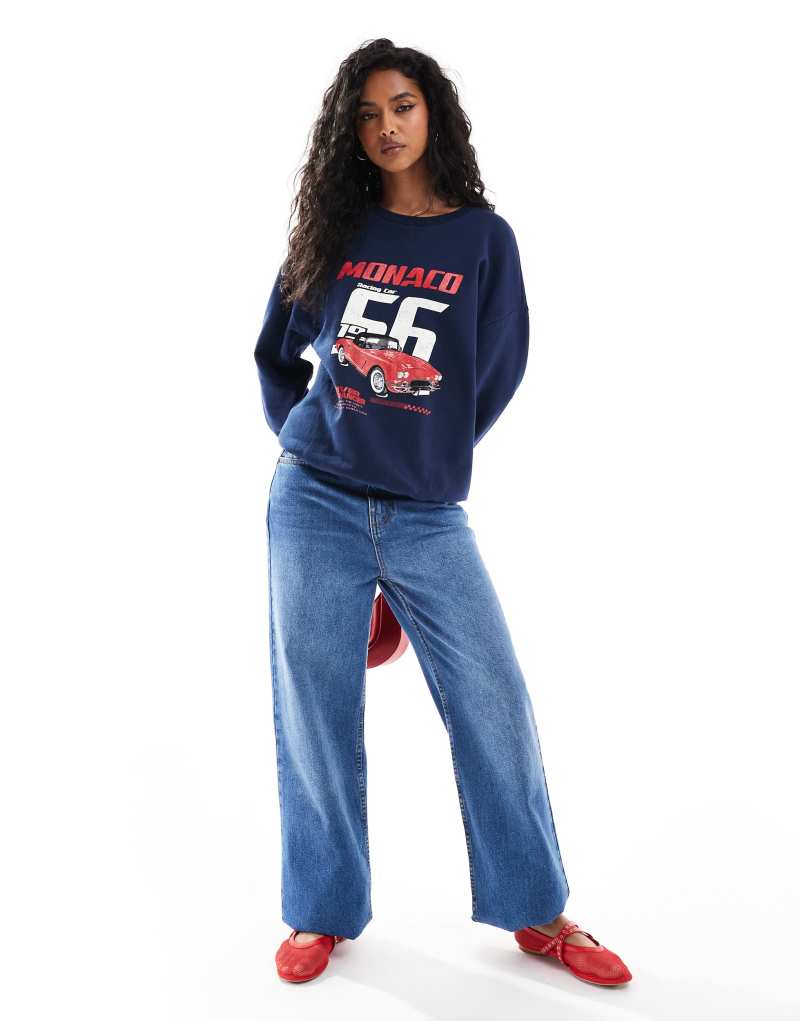 ASOS DESIGN sweatshirt with car graphic in navy ASOS DESIGN