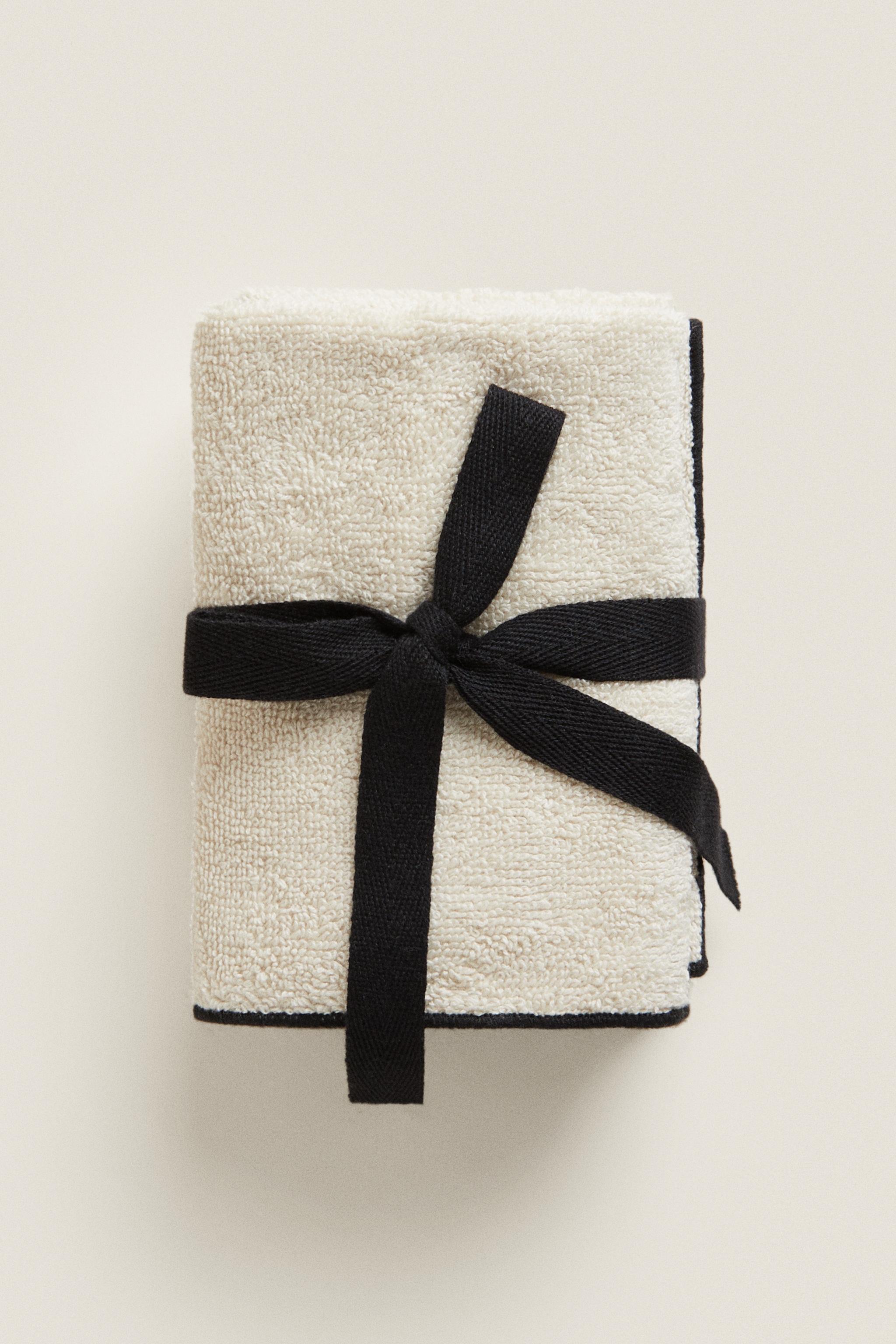 PACK OF COTTON OVERLOCK HAND TOWELS (PACK OF 3) Zara Home