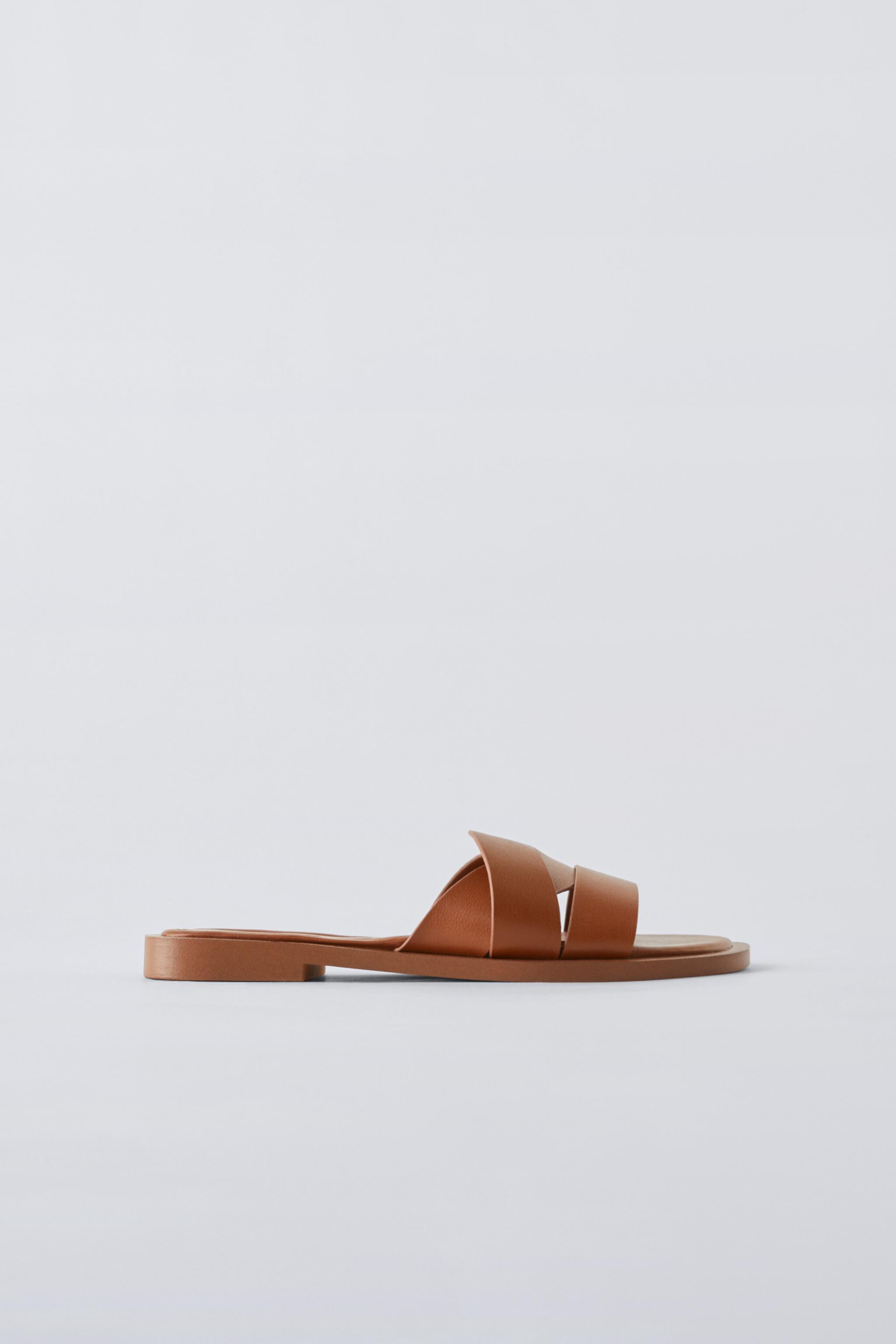 FLAT CROSSED-STRAP SANDALS Zara