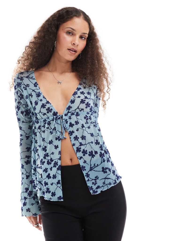 Motel gerbera flocked tie-front blouse in blue and navy Motel