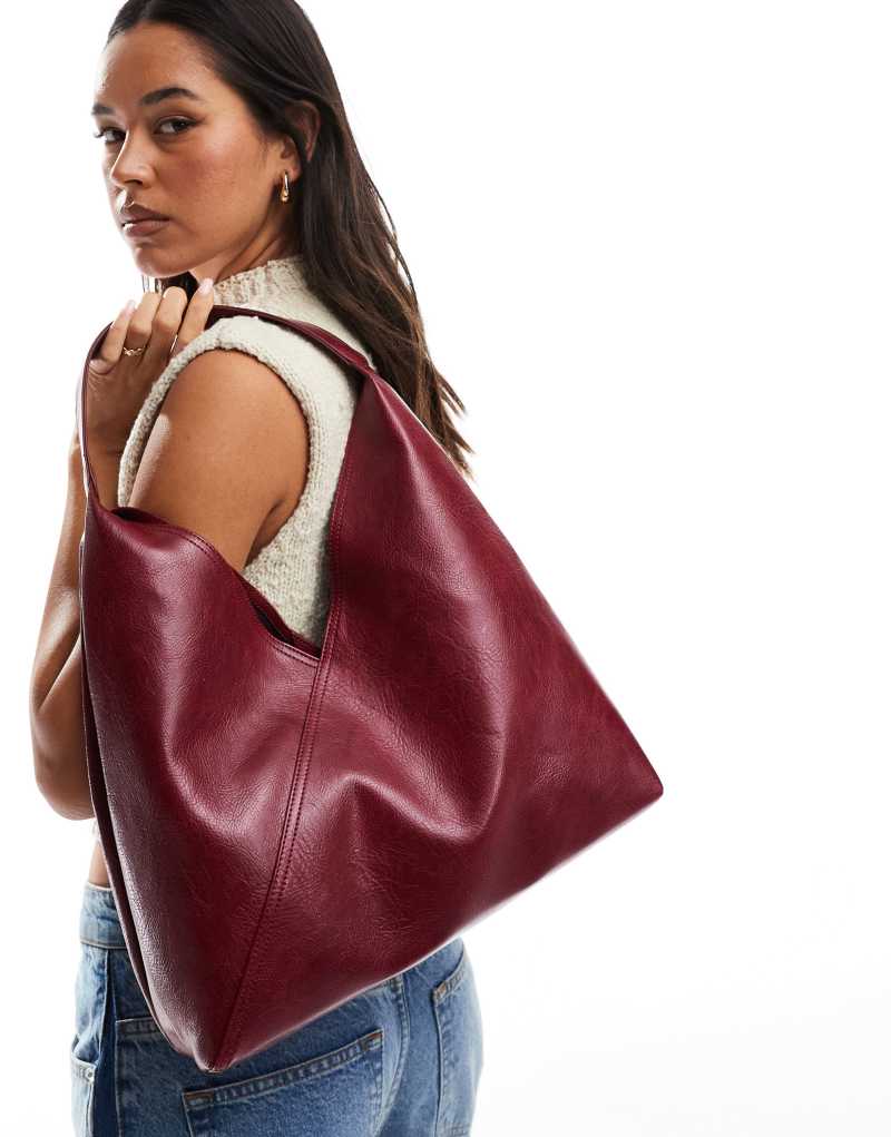 ASOS DESIGN slouch tote bag with crossover panel detail in burgundy Asos Design