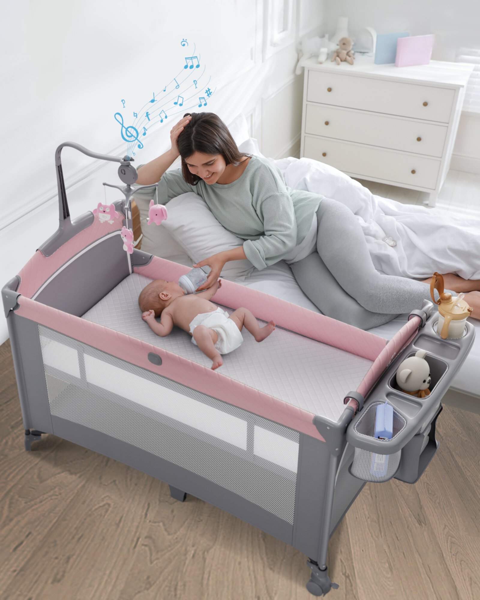 5 in 1 Baby Bassinet Bedside Sleeper, Rocking Bassinet for Baby, Easy Folding Portable Playards, Pack and Play with Mattress, Diaper Changer and Music Mobile Pink Baby