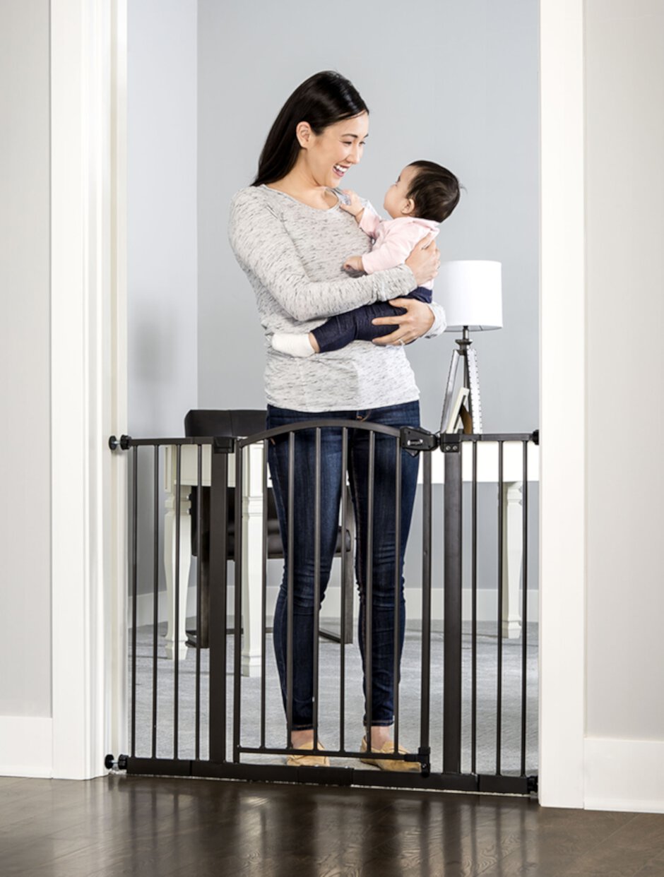 Regalo Easy Step Arched Décor Walk Thru Baby Gate, Includes 4-Inch Extension Kit, 4 Pack Pressure Mount Kit and 4 Pack Wall Mount Kit, Bronze Regalo