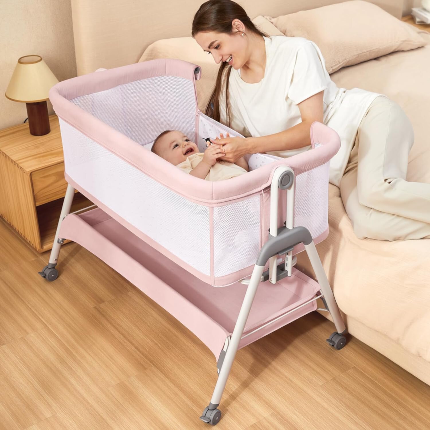 ANGELBLISS Flat Bedside Bassinet with Storage Basket, Easy Folding Portable Crib with Wheels, Included Breathable Mesh, Cozy Mattress(Pale Pink)(0-6 months) ANGELBLISS