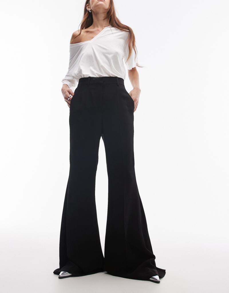 Mango wide leg flared pants in black MANGO