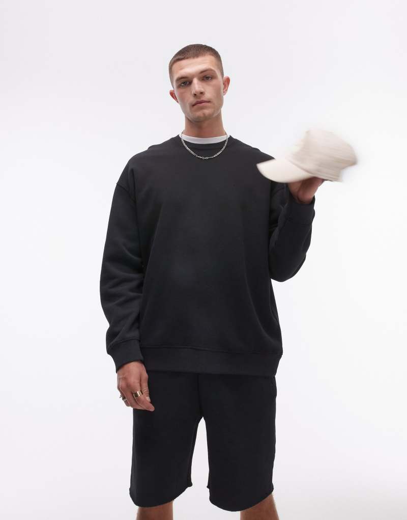 Topman washed oversized sweatshirt in black TOPMAN