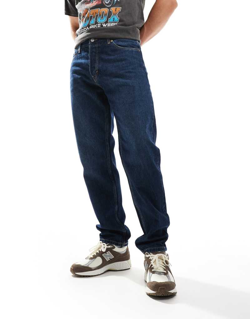 Weekday Barrel relaxed fit tapered jeans in compact blue wash Weekday