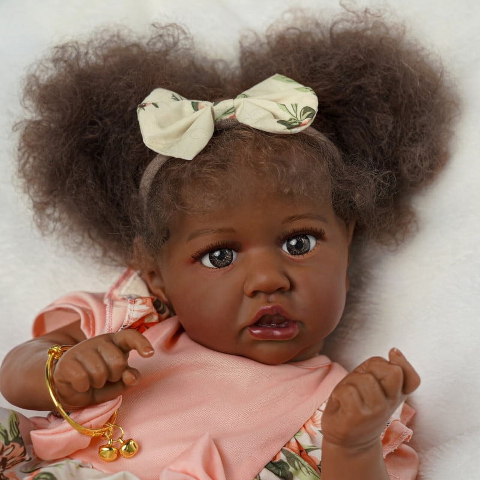 RSG Reborn Baby Dolls Black - 22 Inch Lifelike Soft Body Realistic-Newborn Baby Dolls Taupe Eyes Caramel Skin Tone Green Dress Real Life Baby Dolls and Toy Accessories Gift for Kids Age 3 Babeside