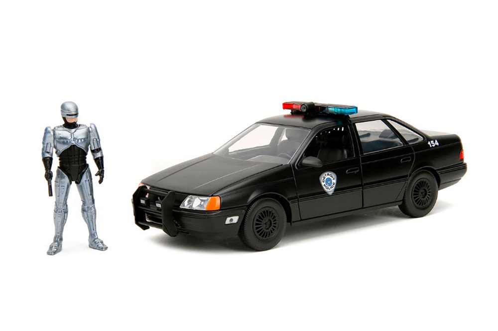 1986 Taurus OCP Detroit Police w/ Robocop Figure - Jada Toys 33743 - 1/24 Scale Diecast Car JADA TOYS