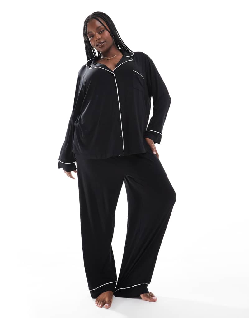 ASOS DESIGN Curve super soft long sleeve shirt & pants pajama set with contrast piping in black ASOS Curve