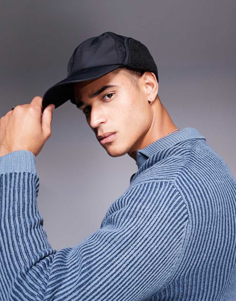 ASOS DESIGN nylon trapper cap with teddy fleece in black ASOS DESIGN