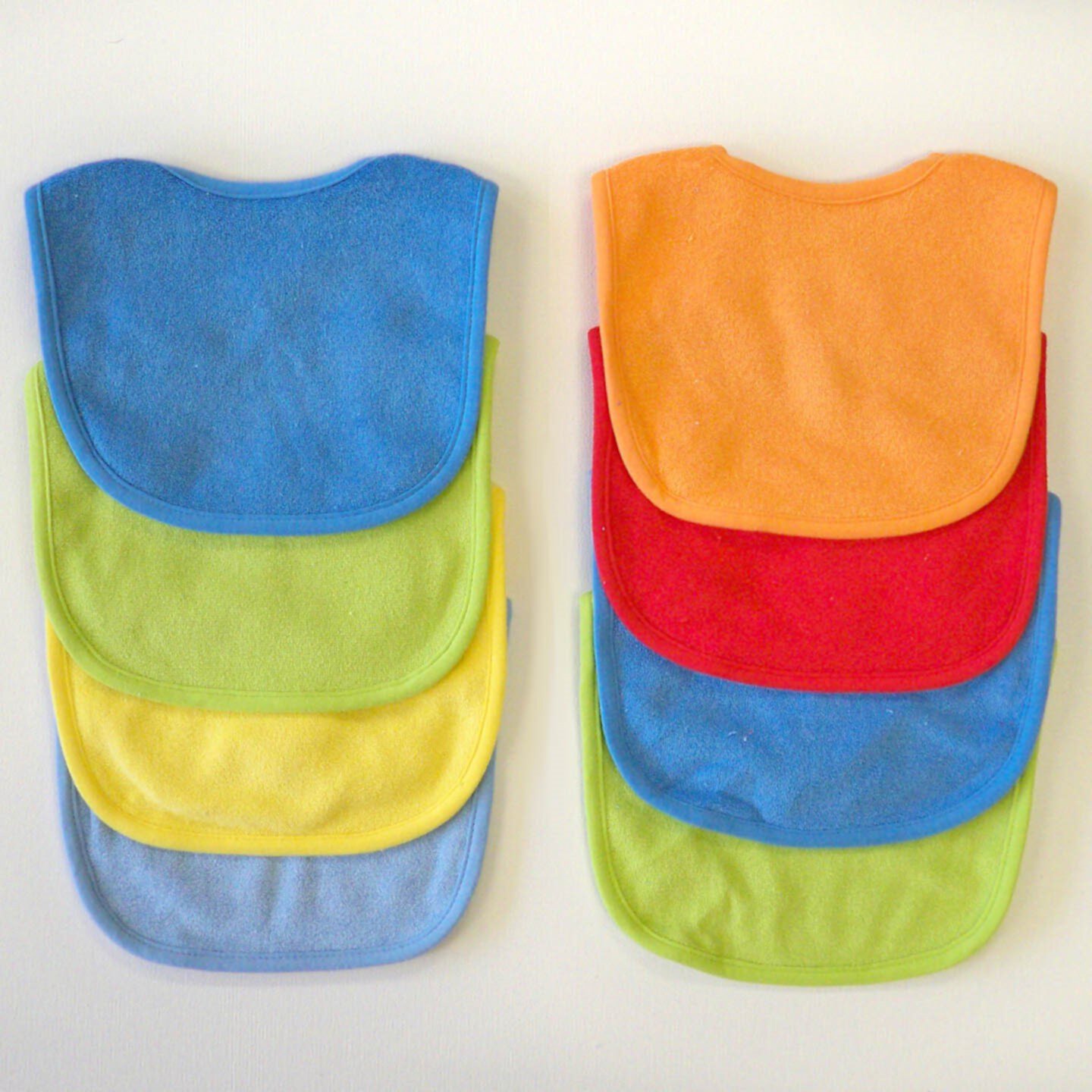 Neat Solutions Solid Multi Color Bib Set, Boy, 8 Pack Neat Solutions