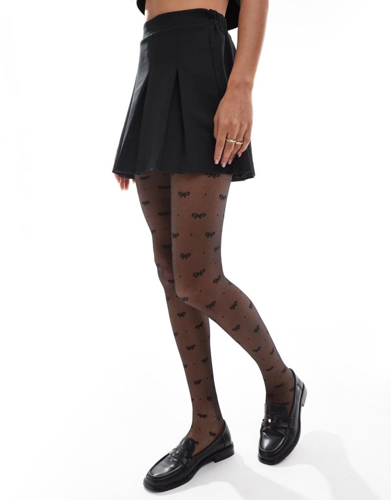 ASOS DESIGN bow and dot tights in black ASOS DESIGN