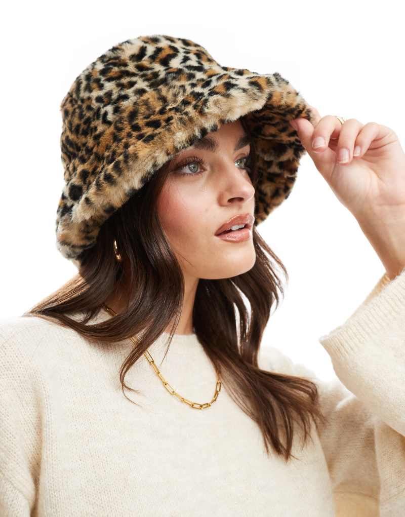 ASOS DESIGN faux fur bucket hat in leopard design ASOS DESIGN