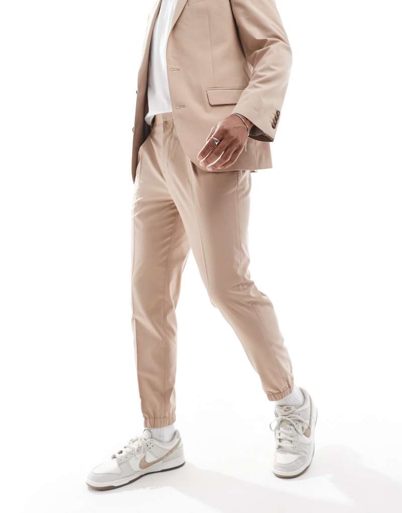 ASOS DESIGN tapered suit sweatpants in beige ASOS DESIGN