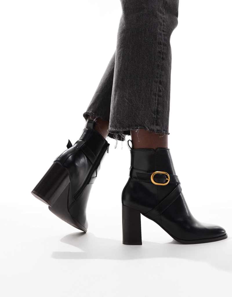 ASOS DESIGN Wide Fit Regan mid-heel buckle boots in black ASOS DESIGN