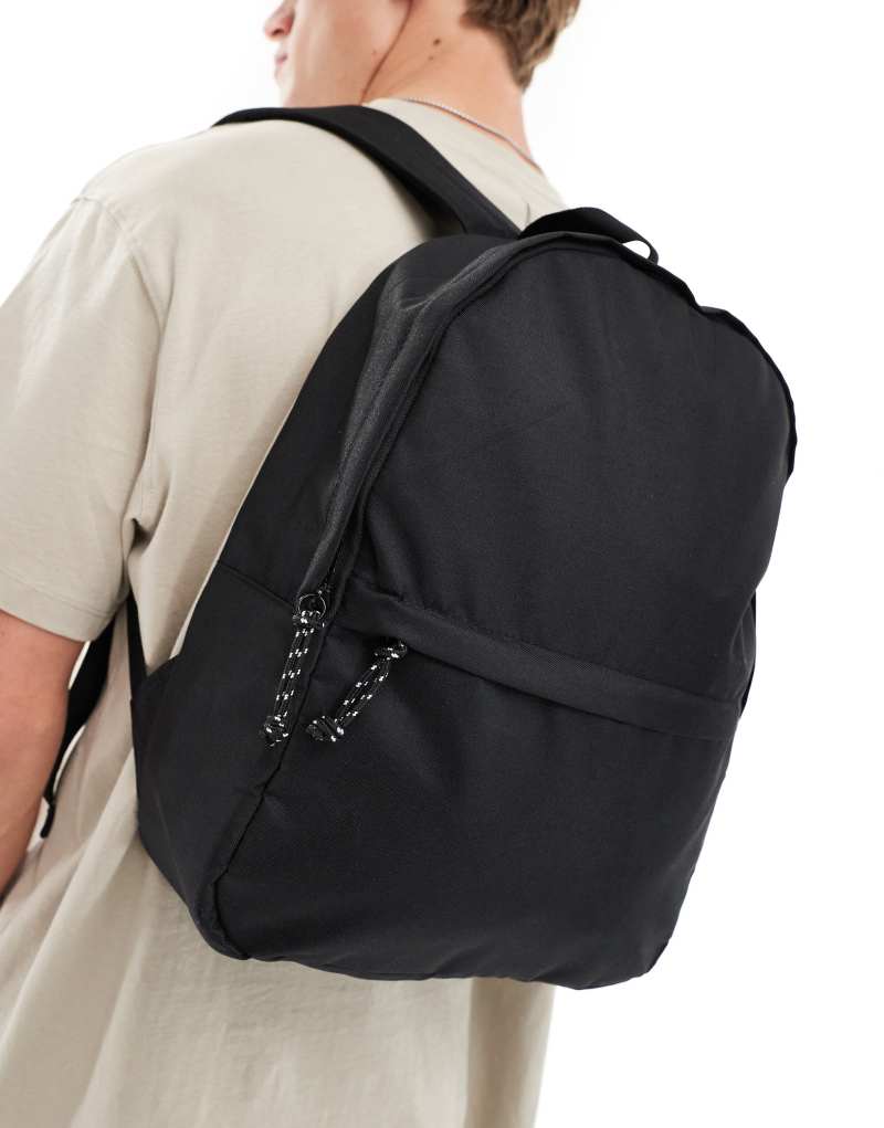 ASOS DESIGN backpack in black nylon with contrast zipper pull ASOS DESIGN