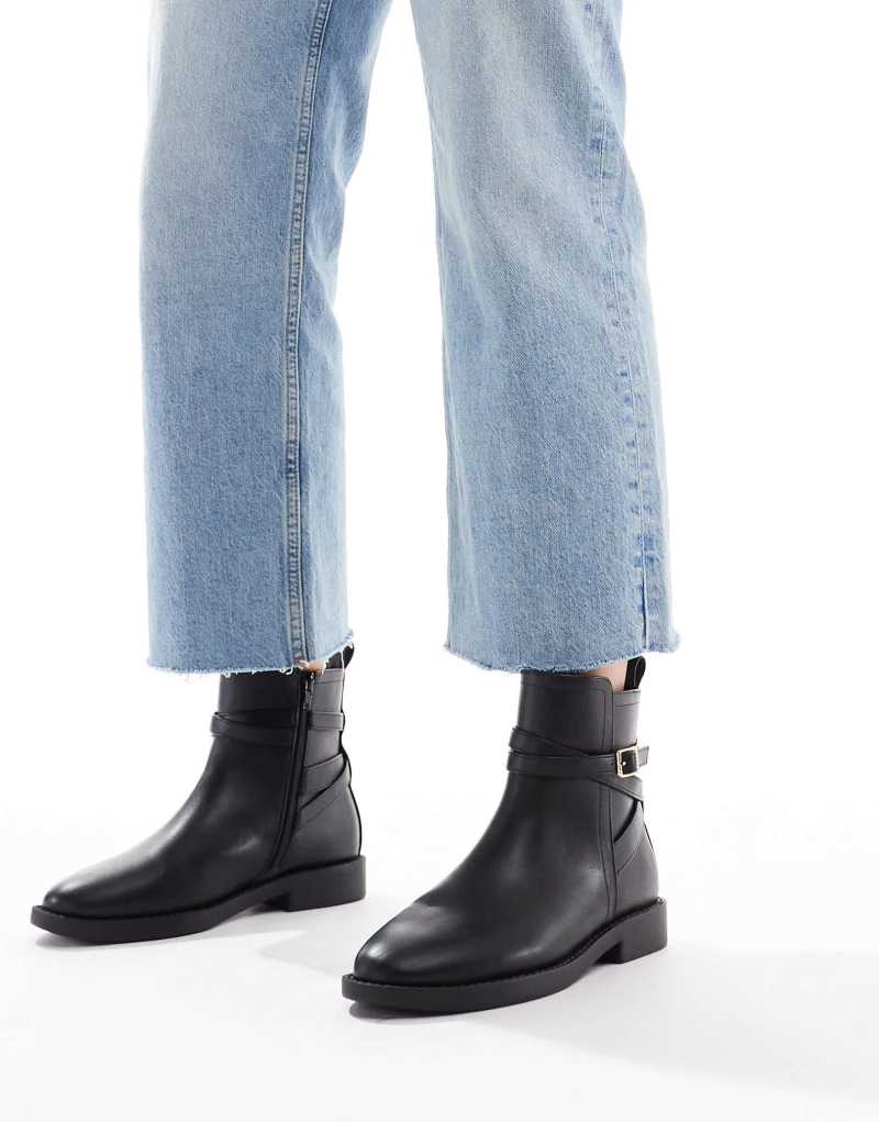 ASOS DESIGN Aria flat chelsea boots with buckle detail in black ASOS DESIGN