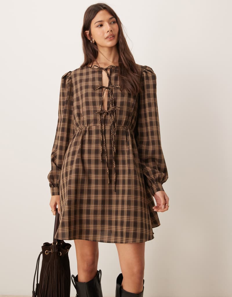 Glamorous long sleeve mini smock dress with front ties in pink brown plaid GLAMOROUS