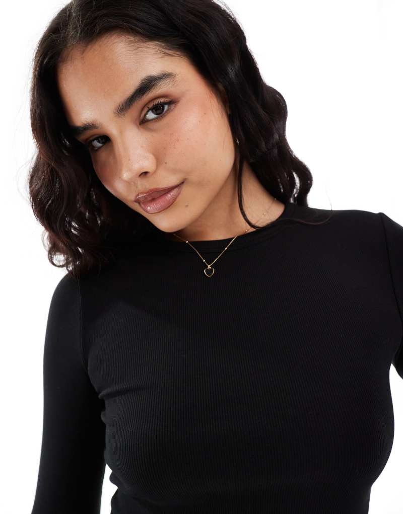 Stradivarius ribbed round neck long sleeve top in black Stradivarius