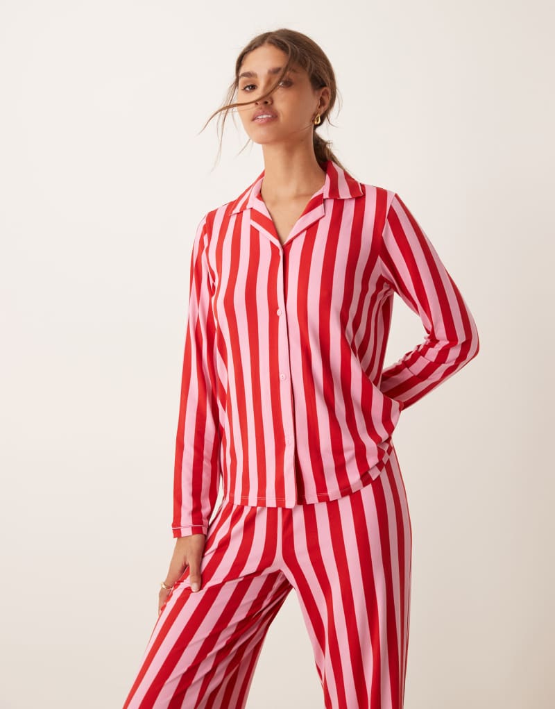 Urban Threads Christmas poly long sleeve revere and pants pajama set in pink and red stripe print Urban Threads