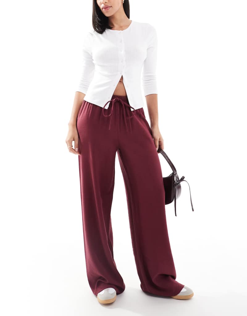 ASOS DESIGN soft tailored wide leg pull on pants in burgundy ASOS DESIGN