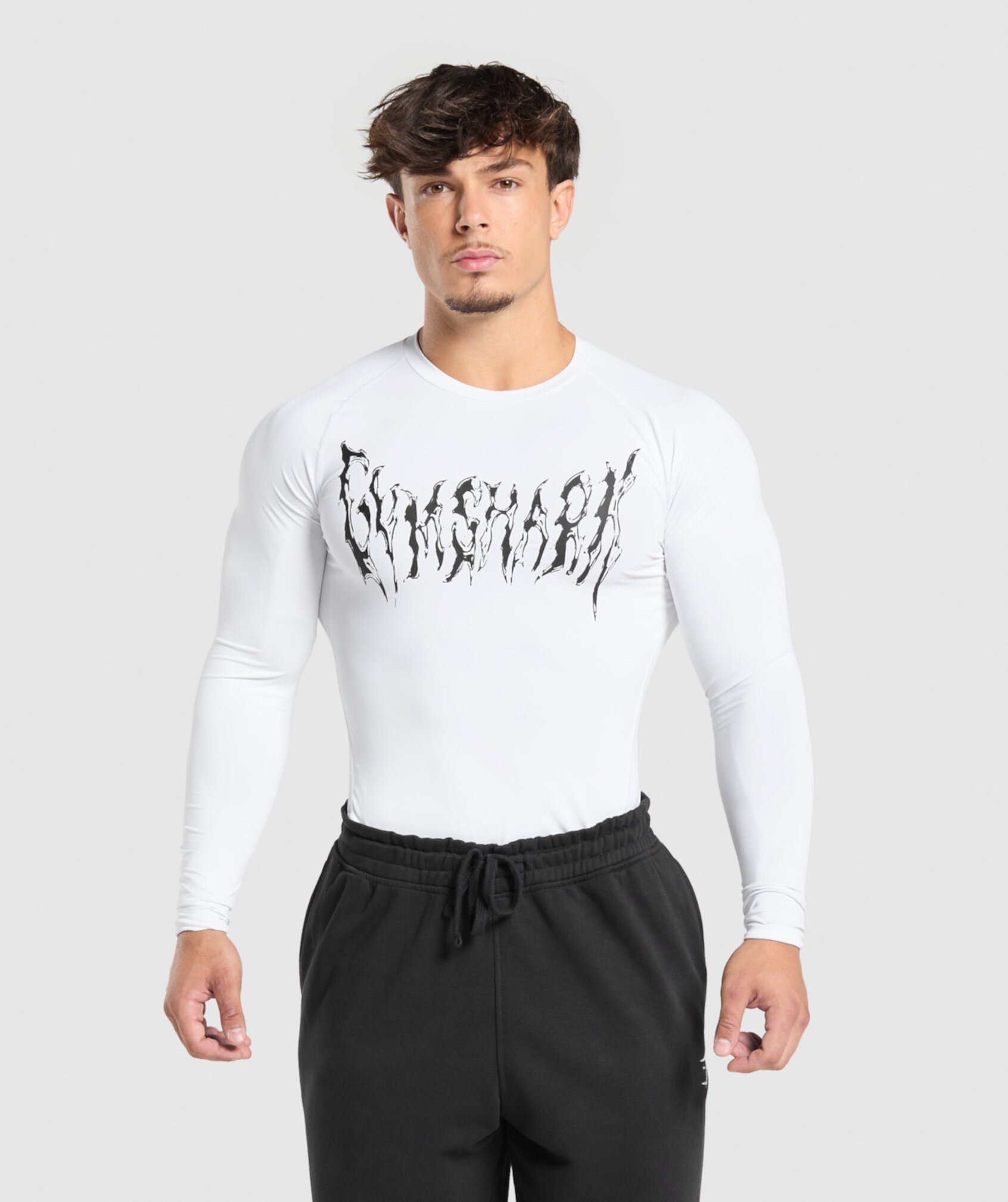 Футболка с длинным рукавом Graphic Baselayer от Gymshark с компрессионной посадкой и восстанавливающими швами Gymshark