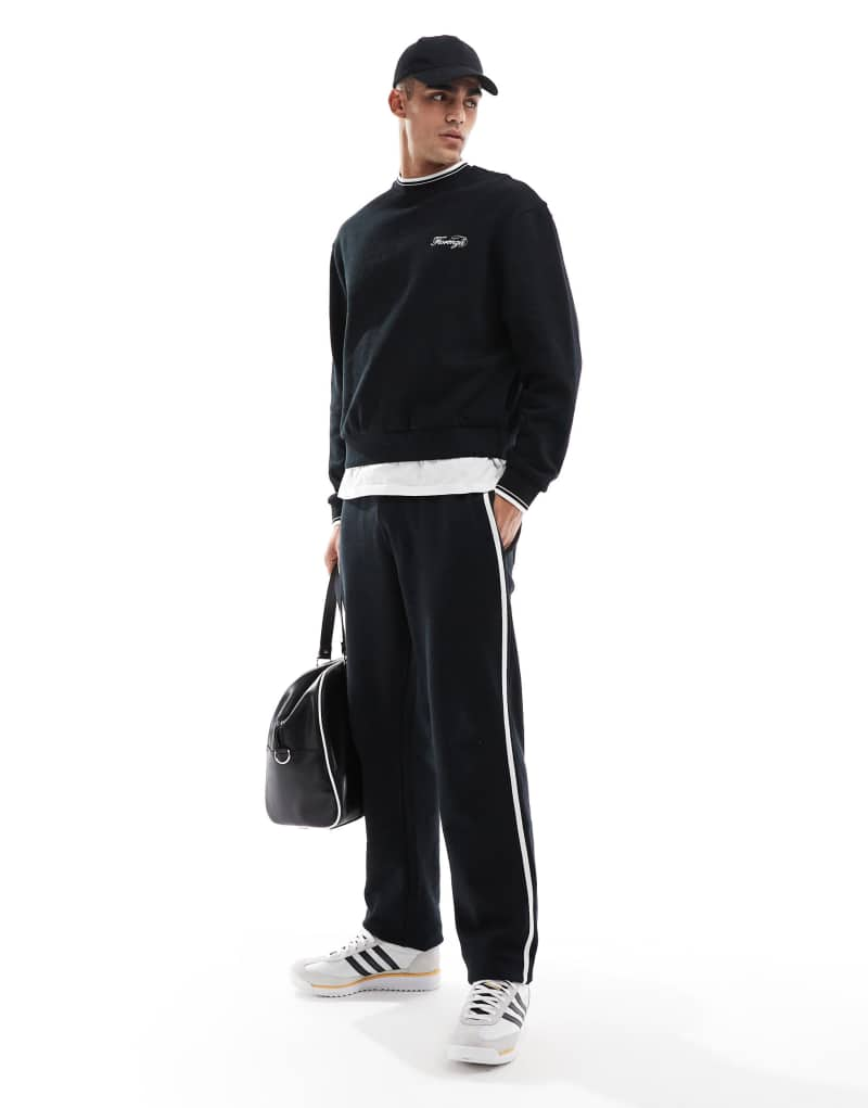 ASOS DESIGN straight leg sweatpants with textured side stripes in black ASOS DESIGN