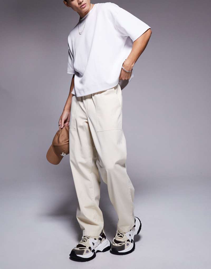 ASOS DESIGN pull on pants with carpenter detailing in beige ASOS DESIGN