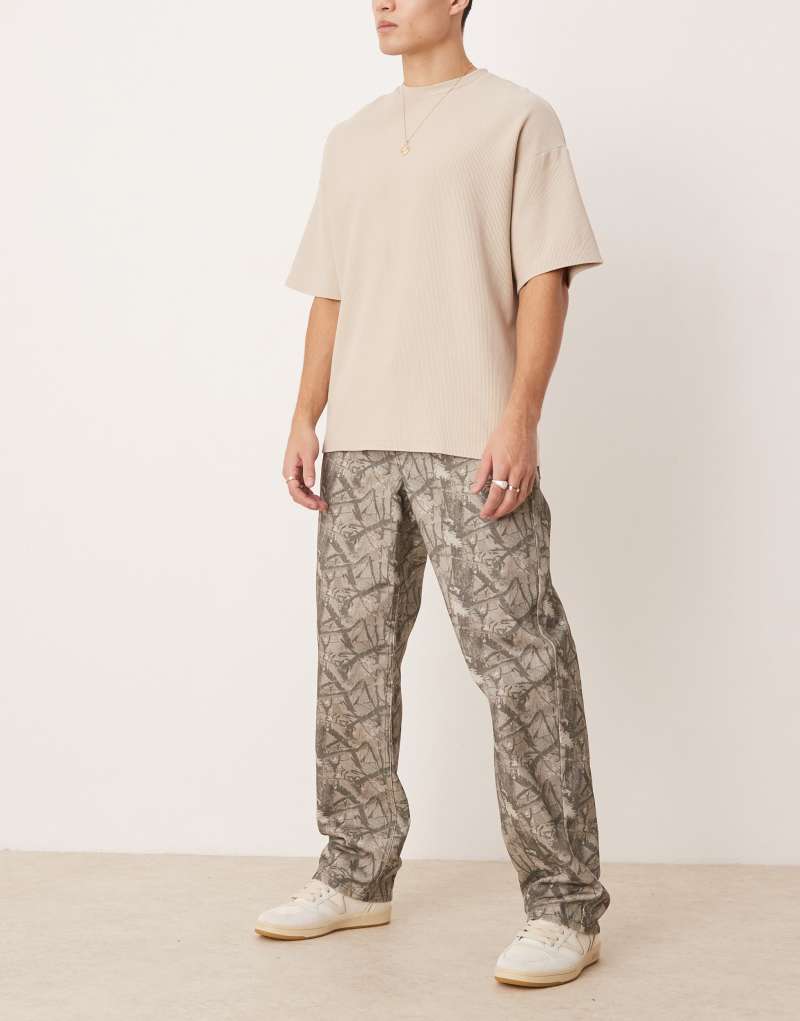 ASOS DESIGN super baggy pants with camouflage print ASOS DESIGN