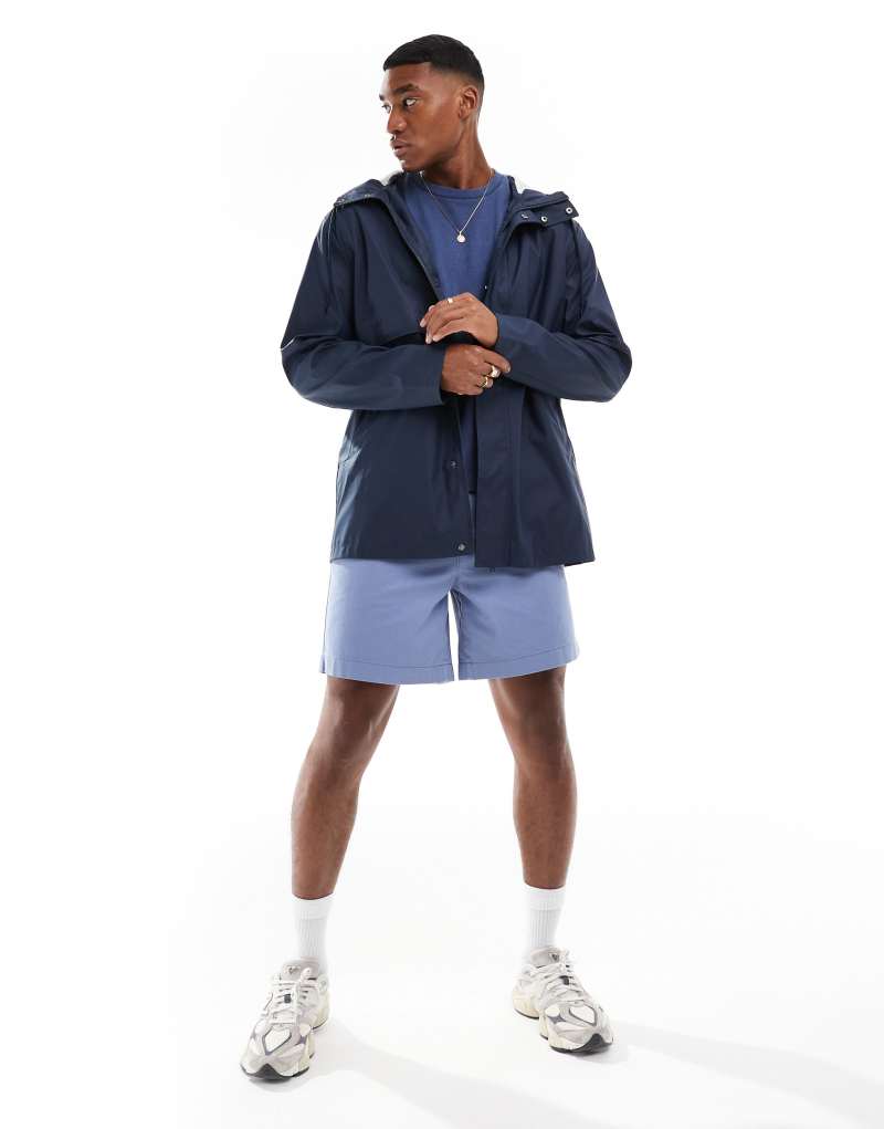 ASOS DESIGN rain resistant rubberized rain jacket in navy ASOS DESIGN