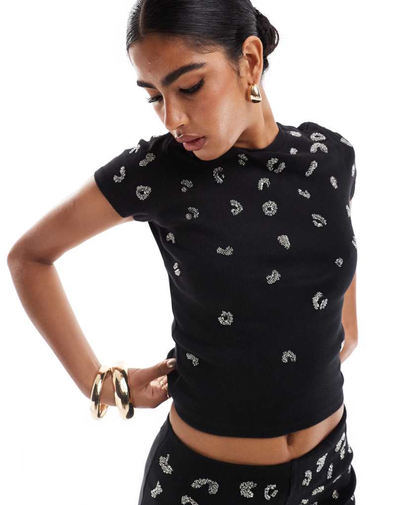 ASOS DESIGN ribbed baby tee with all over leopard sequins in black ASOS DESIGN