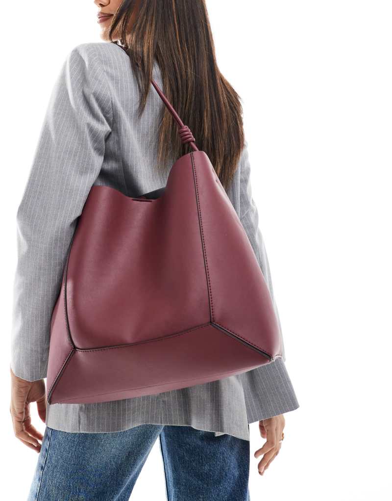 ASOS DESIGN paneled tote bag with knot handle in burgundy ASOS DESIGN