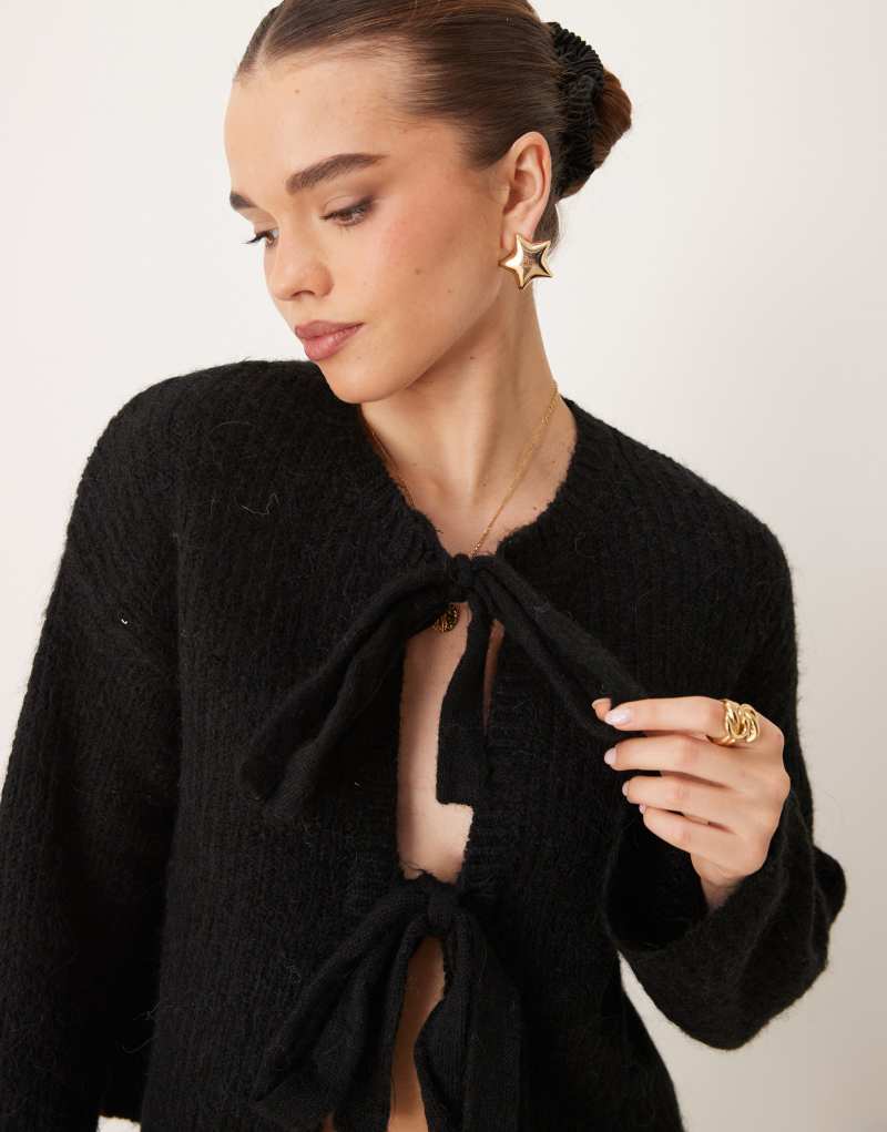 Gina Tricot supersoft front bow tie detail knitted rib cardigan in black GINA TRICOT