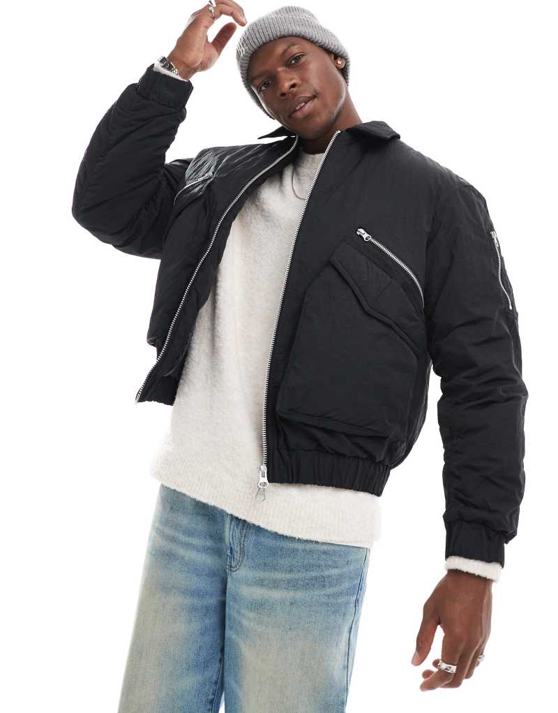 Jack & Jones bomber jacket with zip pockets in black  Jack & Jones