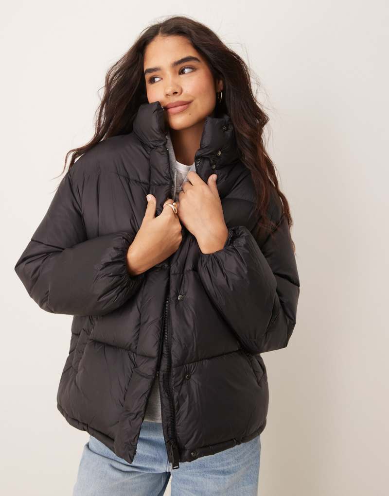 Mango funnel collar puffer coat in black MANGO